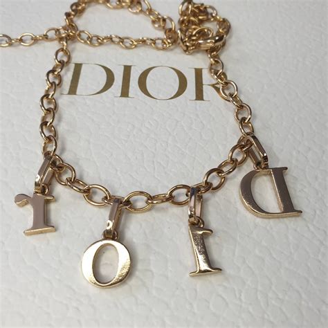 christian dior chain necklace silver|dior letters necklace value.